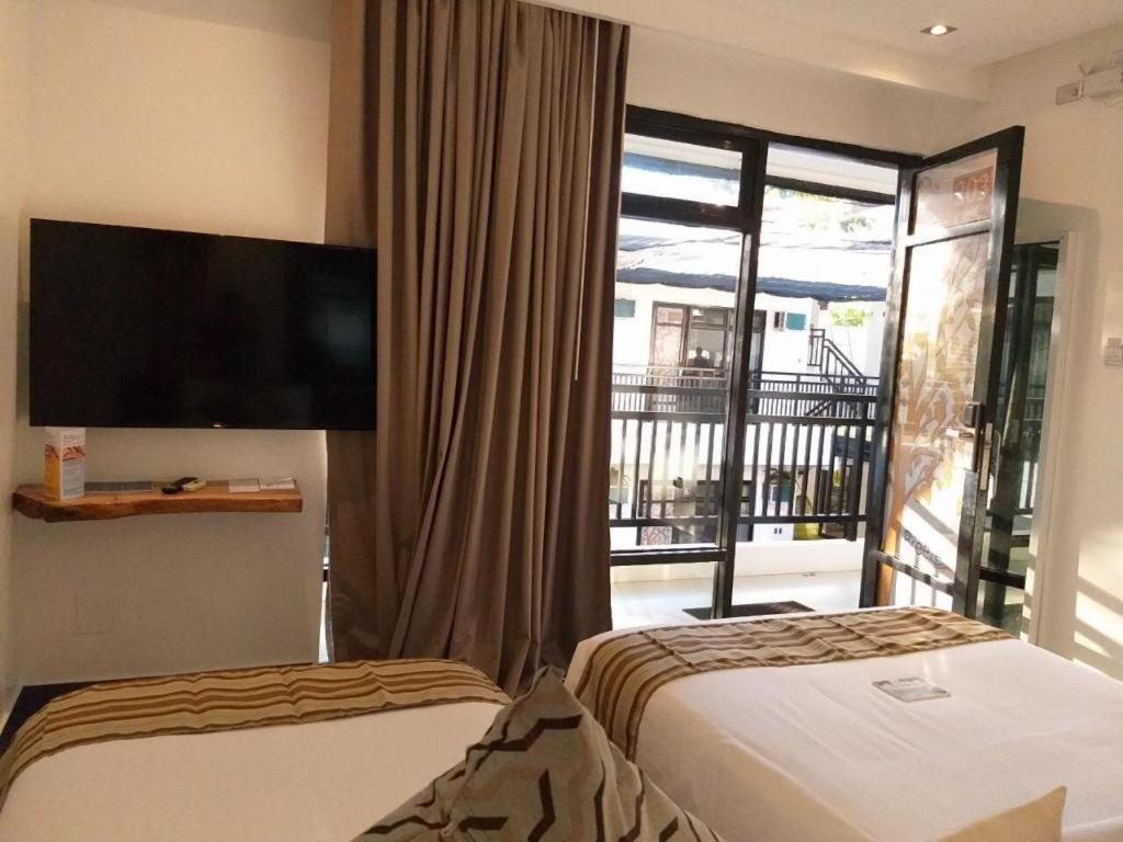 White Breeze Palawan Boutique Hotel Puerto Princesa Luaran gambar